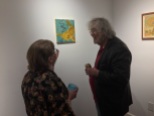 Discussing "The Oracle" with a with a gallery patron