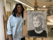 Student Stacey Slaughter with her final class Chiaroscuro drawing